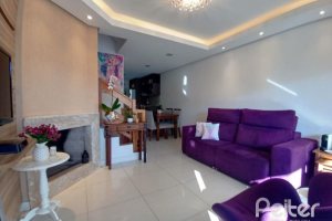 Casa à venda com 118m², 3 dormitórios, 1 suíte, 2 vagas, no bairro Hípica em Porto Alegre