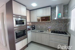 Casa à venda com 118m², 3 dormitórios, 1 suíte, 2 vagas, no bairro Hípica em Porto Alegre