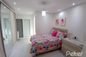 Casa à venda com 118m², 3 dormitórios, 1 suíte, 2 vagas, no bairro Hípica em Porto Alegre