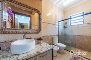 Casa à venda com 377m², 4 dormitórios, 3 suítes, 4 vagas, no bairro Vila Assunção em Porto Alegre