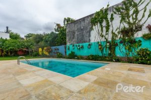 Casa à venda com 377m², 4 dormitórios, 3 suítes, 4 vagas, no bairro Vila Assunção em Porto Alegre