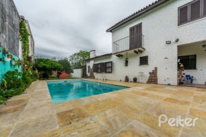 Casa à venda com 377m², 4 dormitórios, 3 suítes, 4 vagas, no bairro Vila Assunção em Porto Alegre