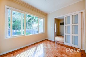 Casa à venda com 120m², 3 dormitórios, 2 vagas, no bairro Ipanema em Porto Alegre