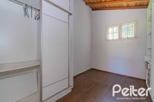 Casa à venda com 134m², 2 dormitórios, 2 suítes, 2 vagas, no bairro Vila Assunção em Porto Alegre