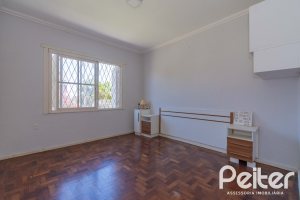 Casa à venda com 134m², 2 dormitórios, 2 suítes, 2 vagas, no bairro Vila Assunção em Porto Alegre