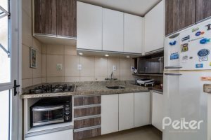 Casa em Condomínio à venda com 126m², 3 dormitórios, 1 suíte, 2 vagas, no bairro Tristeza em Porto Alegre