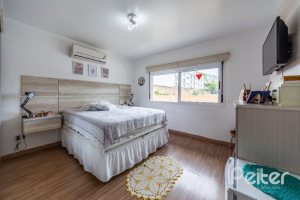 Casa em Condomínio à venda com 126m², 3 dormitórios, 1 suíte, 2 vagas, no bairro Tristeza em Porto Alegre