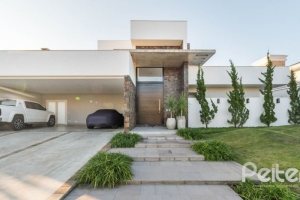 Casa em Condomínio à venda com 480m², 4 dormitórios, 4 suítes, 4 vagas, no bairro Terra Ville em PORTO ALEGRE