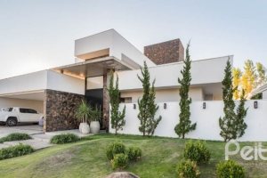 Casa em Condomínio à venda com 480m², 4 dormitórios, 4 suítes, 4 vagas, no bairro Terra Ville em PORTO ALEGRE