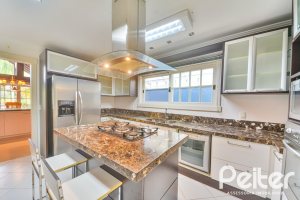 Casa em Condomínio à venda com 358m², 3 dormitórios, 3 suítes, 4 vagas, no bairro Terra Ville em PORTO ALEGRE