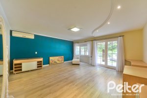 Casa em Condomínio à venda com 358m², 3 dormitórios, 3 suítes, 4 vagas, no bairro Terra Ville em PORTO ALEGRE