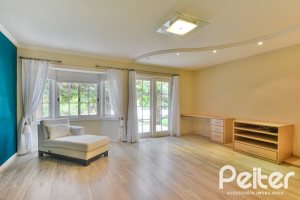 Casa em Condomínio à venda com 358m², 3 dormitórios, 3 suítes, 4 vagas, no bairro Terra Ville em PORTO ALEGRE