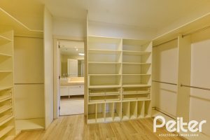 Casa em Condomínio à venda com 358m², 3 dormitórios, 3 suítes, 4 vagas, no bairro Terra Ville em PORTO ALEGRE