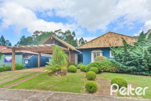 Casa em Condomínio à venda com 358m², 3 dormitórios, 3 suítes, 4 vagas, no bairro Terra Ville em PORTO ALEGRE