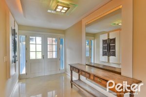 Casa em Condomínio à venda com 358m², 3 dormitórios, 3 suítes, 4 vagas, no bairro Terra Ville em PORTO ALEGRE
