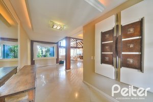 Casa em Condomínio à venda com 358m², 3 dormitórios, 3 suítes, 4 vagas, no bairro Terra Ville em PORTO ALEGRE