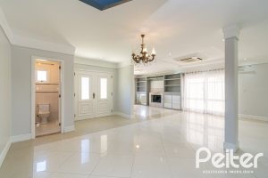 Casa em Condomínio à venda com 217m², 3 dormitórios, 1 suíte, 2 vagas, no bairro Terra Ville em Porto Alegre