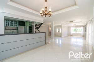 Casa em Condomínio à venda com 217m², 3 dormitórios, 1 suíte, 2 vagas, no bairro Terra Ville em Porto Alegre