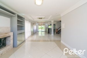 Casa em Condomínio à venda com 217m², 3 dormitórios, 1 suíte, 2 vagas, no bairro Terra Ville em Porto Alegre