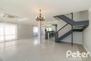 Casa em Condomínio à venda com 217m², 3 dormitórios, 1 suíte, 2 vagas, no bairro Terra Ville em Porto Alegre