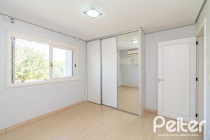 Casa em Condomínio à venda com 217m², 3 dormitórios, 1 suíte, 2 vagas, no bairro Terra Ville em Porto Alegre