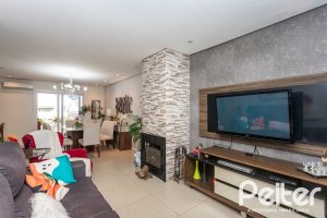 Casa em Condomínio à venda com 132m², 3 dormitórios, 1 suíte, 2 vagas, no bairro Vila Nova em PORTO ALEGRE