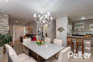 Casa em Condomínio à venda com 132m², 3 dormitórios, 1 suíte, 2 vagas, no bairro Vila Nova em PORTO ALEGRE