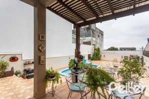 Casa em Condomínio à venda com 132m², 3 dormitórios, 1 suíte, 2 vagas, no bairro Vila Nova em PORTO ALEGRE