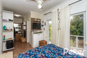 Casa em Condomínio à venda com 132m², 3 dormitórios, 1 suíte, 2 vagas, no bairro Vila Nova em PORTO ALEGRE