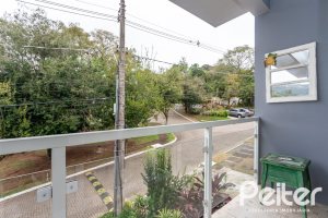 Casa em Condomínio à venda com 132m², 3 dormitórios, 1 suíte, 2 vagas, no bairro Vila Nova em PORTO ALEGRE