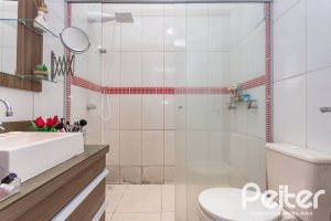 Casa em Condomínio à venda com 132m², 3 dormitórios, 1 suíte, 2 vagas, no bairro Vila Nova em PORTO ALEGRE