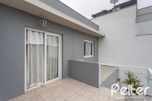Casa em Condomínio à venda com 132m², 3 dormitórios, 1 suíte, 2 vagas, no bairro Vila Nova em PORTO ALEGRE