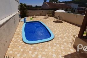 Casa em Condomínio à venda com 132m², 3 dormitórios, 1 suíte, 2 vagas, no bairro Vila Nova em PORTO ALEGRE