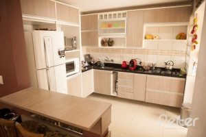 Casa em Condomínio à venda com 132m², 3 dormitórios, 1 suíte, 2 vagas, no bairro Vila Nova em PORTO ALEGRE