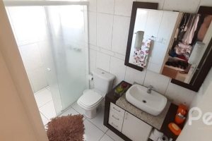 Casa em Condomínio à venda com 132m², 3 dormitórios, 1 suíte, 2 vagas, no bairro Vila Nova em PORTO ALEGRE