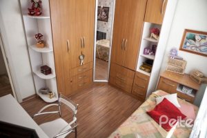 Casa em Condomínio à venda com 132m², 3 dormitórios, 1 suíte, 2 vagas, no bairro Vila Nova em PORTO ALEGRE