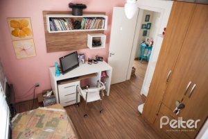 Casa em Condomínio à venda com 132m², 3 dormitórios, 1 suíte, 2 vagas, no bairro Vila Nova em PORTO ALEGRE