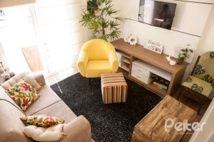 Casa em Condomínio à venda com 132m², 3 dormitórios, 1 suíte, 2 vagas, no bairro Vila Nova em PORTO ALEGRE