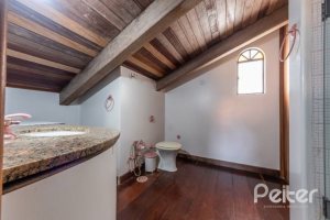 Casa em Condomínio à venda com 654m², 5 dormitórios, 5 suítes, 4 vagas, no bairro Cavalhada em PORTO ALEGRE