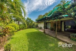 Casa em Condomínio à venda com 654m², 5 dormitórios, 5 suítes, 4 vagas, no bairro Cavalhada em PORTO ALEGRE