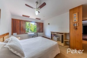 Casa em Condomínio à venda com 654m², 5 dormitórios, 5 suítes, 4 vagas, no bairro Cavalhada em PORTO ALEGRE