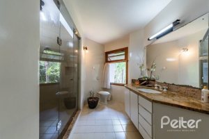 Casa em Condomínio à venda com 654m², 5 dormitórios, 5 suítes, 4 vagas, no bairro Cavalhada em PORTO ALEGRE