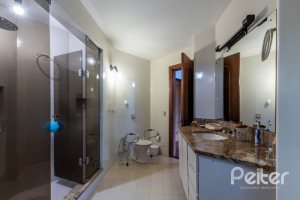 Casa em Condomínio à venda com 654m², 5 dormitórios, 5 suítes, 4 vagas, no bairro Cavalhada em PORTO ALEGRE