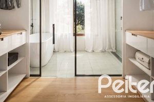 Casa à venda com 276m², 4 dormitórios, 4 suítes, 4 vagas, no bairro Vila Assunção em Porto Alegre