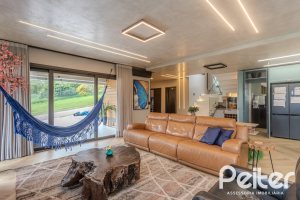 Casa em Condomínio à venda com 359m², 4 dormitórios, 4 suítes, 4 vagas, no bairro Alphaville em PORTO ALEGRE