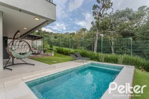 Casa em Condomínio à venda com 359m², 4 dormitórios, 4 suítes, 4 vagas, no bairro Alphaville em PORTO ALEGRE