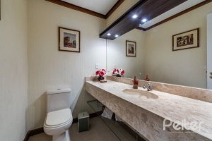 Casa em Condomínio à venda com 449m², 3 dormitórios, 3 suítes, 6 vagas, no bairro Terra Ville em PORTO ALEGRE