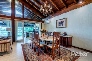 Casa em Condomínio à venda com 449m², 3 dormitórios, 3 suítes, 6 vagas, no bairro Terra Ville em PORTO ALEGRE