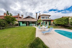 Casa em Condomínio à venda com 449m², 3 dormitórios, 3 suítes, 6 vagas, no bairro Terra Ville em PORTO ALEGRE