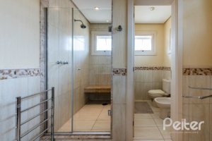 Casa em Condomínio à venda com 449m², 3 dormitórios, 3 suítes, 6 vagas, no bairro Terra Ville em PORTO ALEGRE